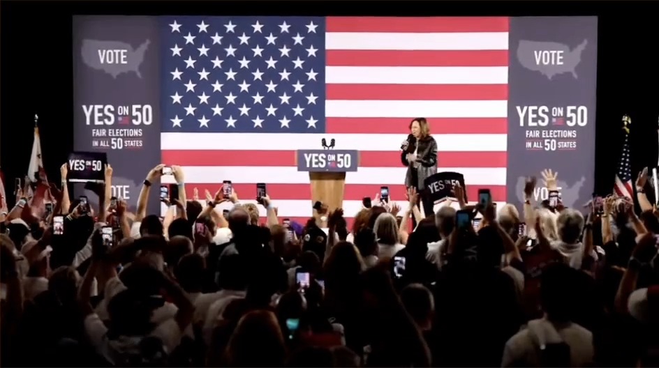 Kamala Harris walks onstage to cheers at a Yes on 50 rally in California