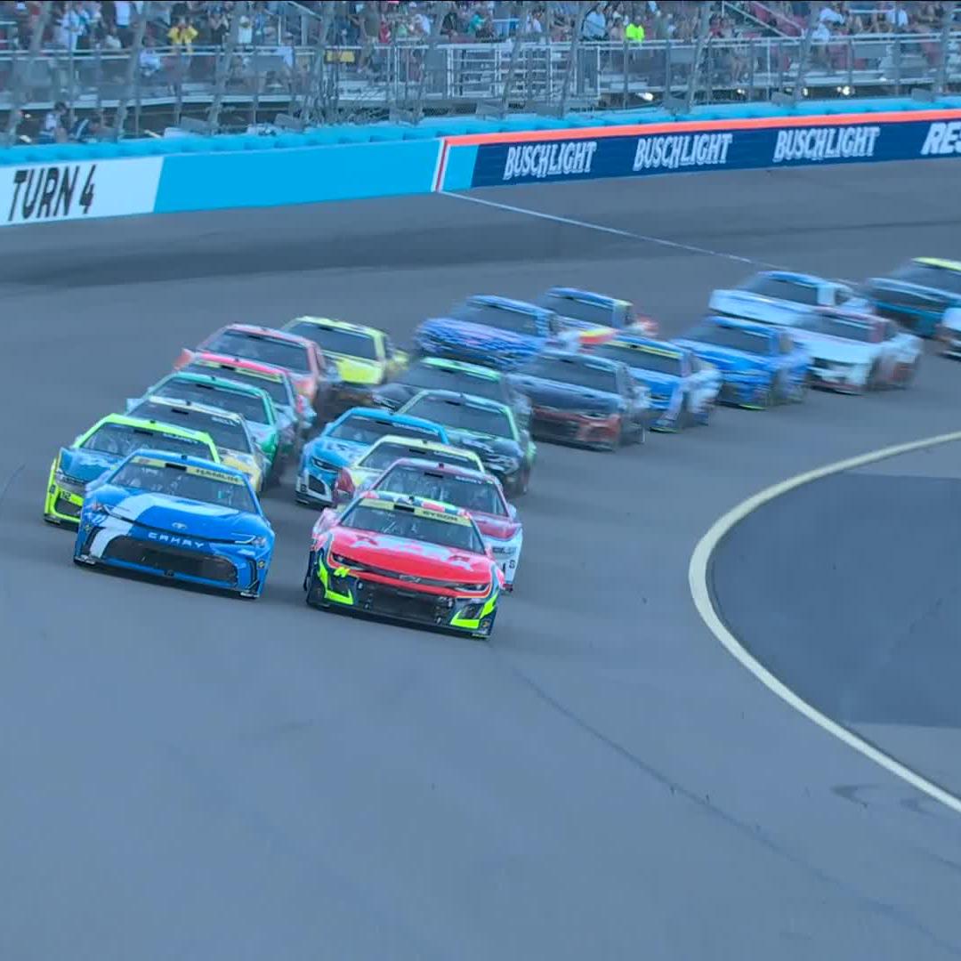 They are door-to-door for the championship lead! Denny Hamlin edges past William Byron on the restart! #Championship4