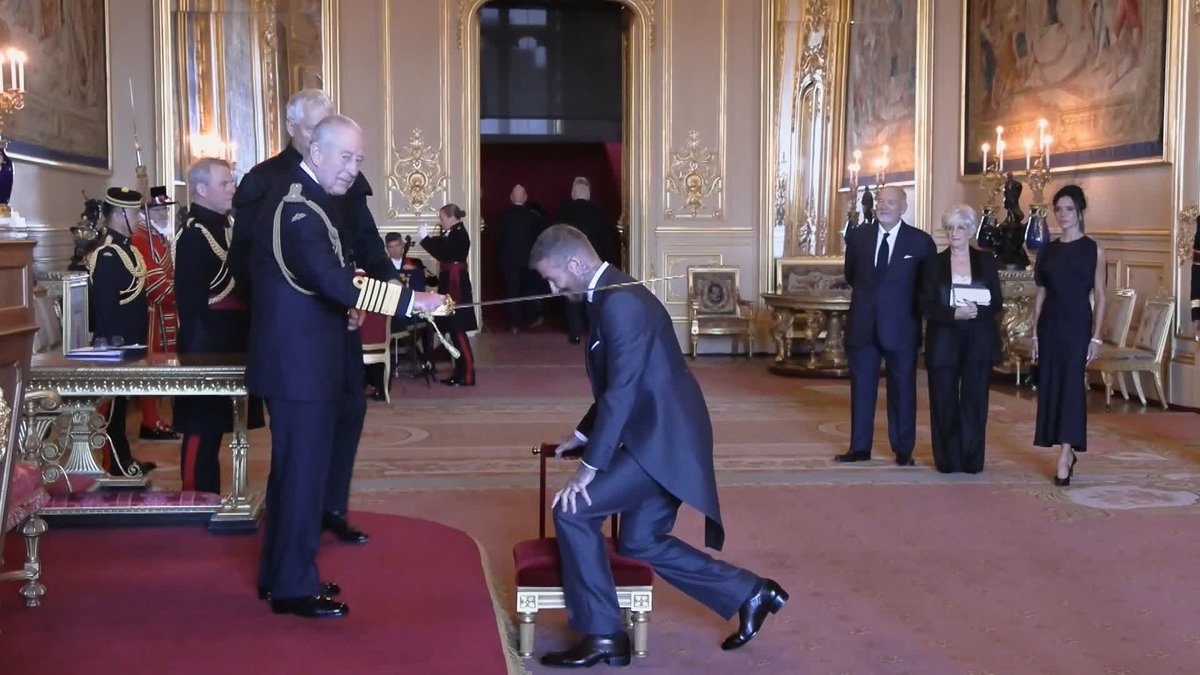 "Being an east end boy, it's a very proud day" Sir David Beckham has been formally knighted by the King at Windsor Castle.