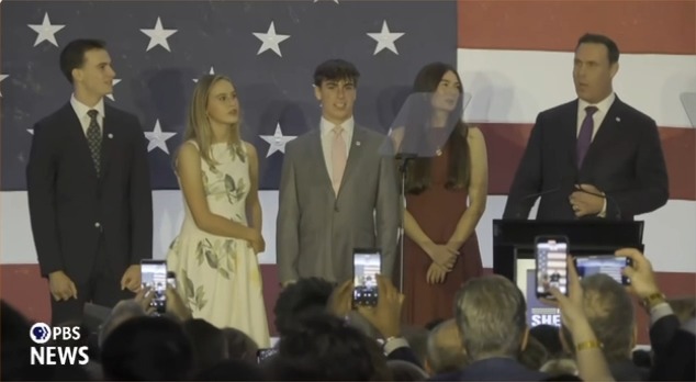 A packed crowd erupts into cheers as Mikie Sherrill walks out as governor-elect of New Jersey.