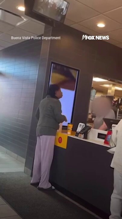 MCDONALD’S MELTDOWN: A woman caught on camera allegedly throwing hot coffee at a McDonald’s manager after a heated dispute now faces an arrest warrant, police say.