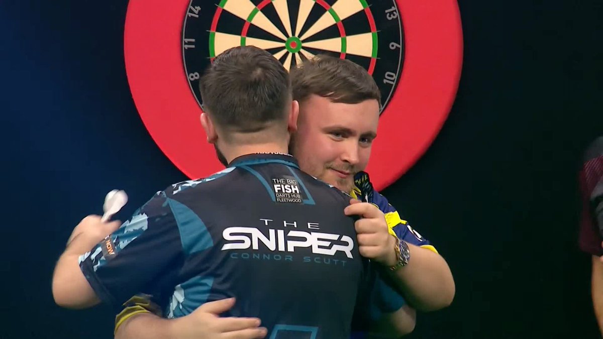 LITTLER WINS AND IS THROUGH! ☢️ Luke Littler averages 105 and fends off a valiant performance from Connor Scutt in a 5-3 win, securing his spot in the last 16! Daryl Gurney is now OUT ❌ 📺 #GSOD | Group E