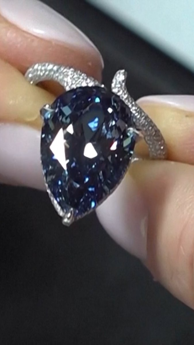 A blue diamond weighing nearly 10 carats has sold at auction in Switzerland for 20.5 million Swiss francs ($25.6 million) including fees.