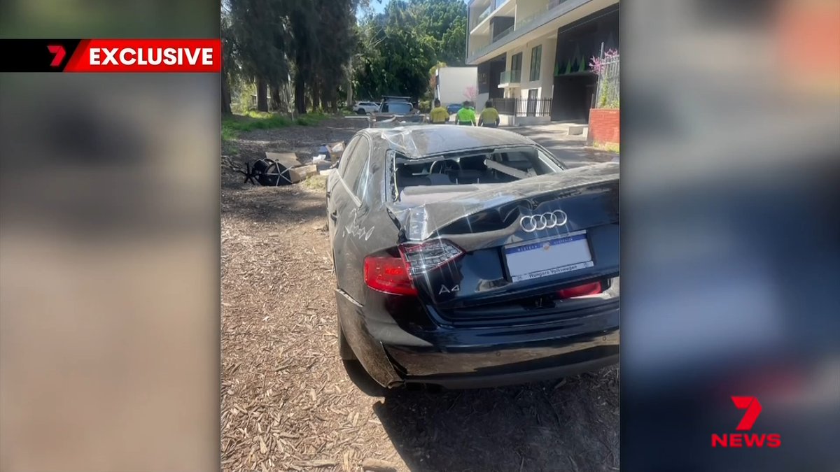 A Perth man has watched in shock and disbelief as his brand new Audi crashed to the ground from a car stacker. The parking machine malfunctioned, sending his car plummeting three storeys. There's now a fight over who should pay.