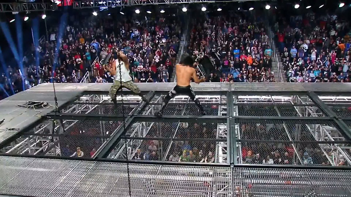 MARK BRISCOE & WHEELER YUTA ON TOP OF THE CAGE. THAT HEADSHOT WITH THE CHAIR. 💀