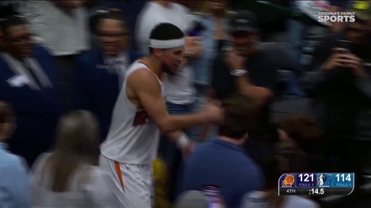 Devin Booker saw a young fan in Dallas wearing his jersey as he went into the stands and gave him a high five 😂 Extremely wholesome 👏