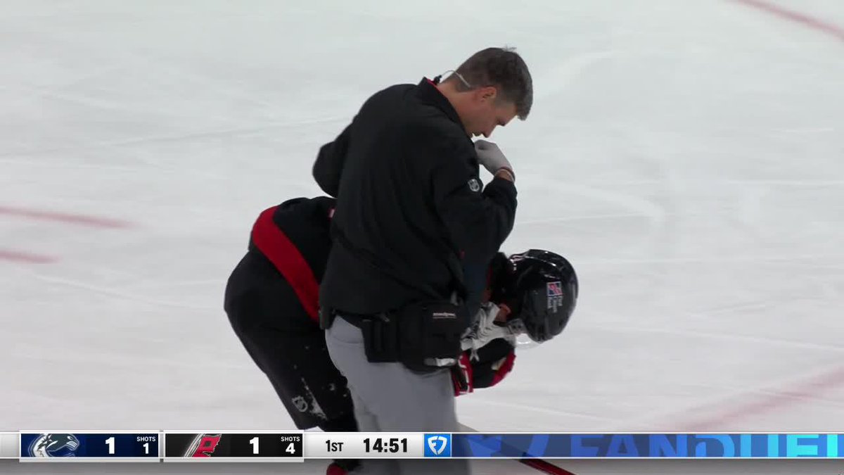 Seth Jarvis was in pain and had to leave the game after taking a high stick from Svechnikov
