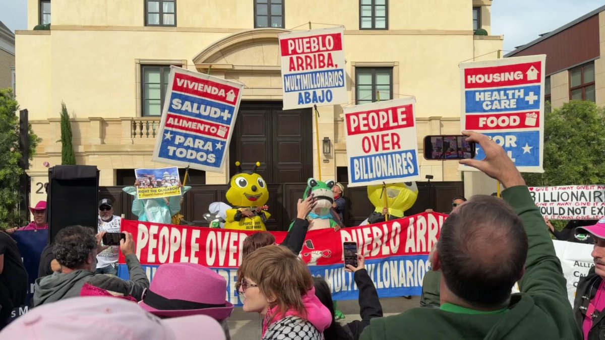 Protesters march during a “People Over Billionaires” protest in the Pacific Heights neighborhood of San Francisco. Read more >>