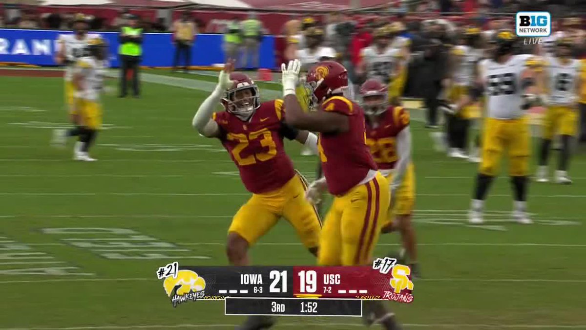 What a wild INT 🤯 USC Football ✌️'s Jahkeem Stewart reels in the ball after it deflects off an Iowa WR's knee 👀 📺: BTN