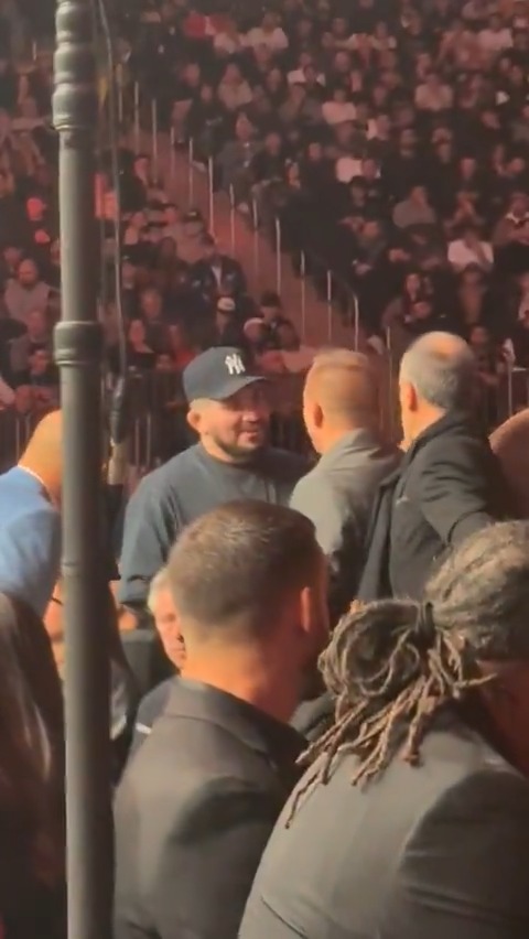 Georges St-Pierre greets Dillon Danis cageside at #UFC322 😬