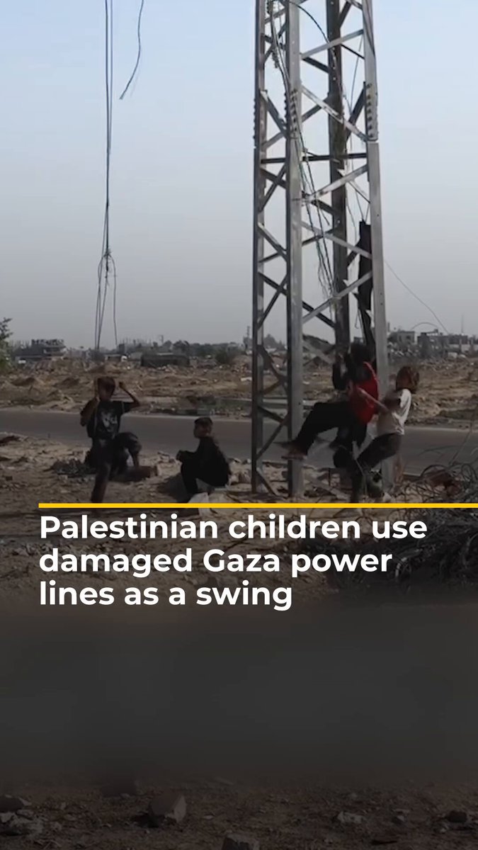 Video shows Palestinian children in Gaza using inoperative power lines as a swing. Israel has cut off electricity to the enclave since the beginning of its genocidal war.