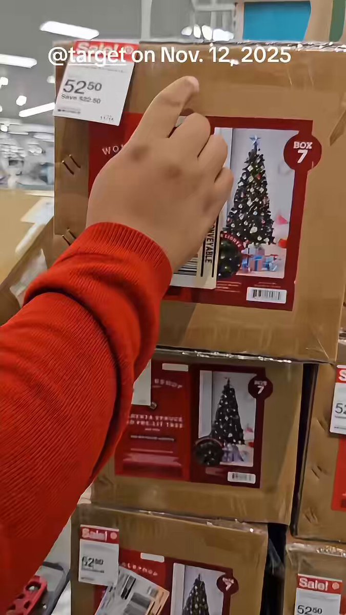 Target Christmas tree pricing scandal American is shopping for a Christmas tree. Target says the cost of the tree is $75 but it’s “On sale” for $52.50. You save $22.50 The woman notices the original prices on the Christmas tree boxes have a sticker over them, she peels it back