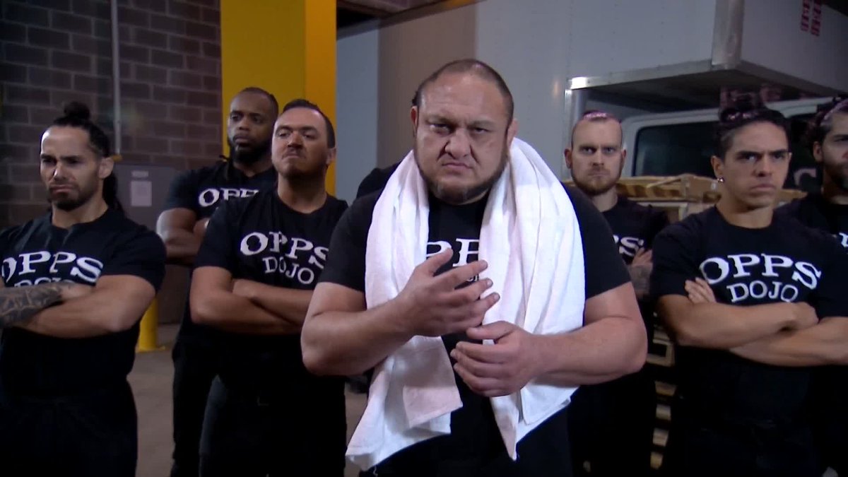 Surrounded by the Opps Dojo, Samoa Joe delivers chilling words to Hangman Adam Page ahead of their #AEW World Title battle inside a steel cage at #AEWFullGear! Watch Full Gear #AEWTailgateBrawl LIVE on TNT &amp; HBO Max