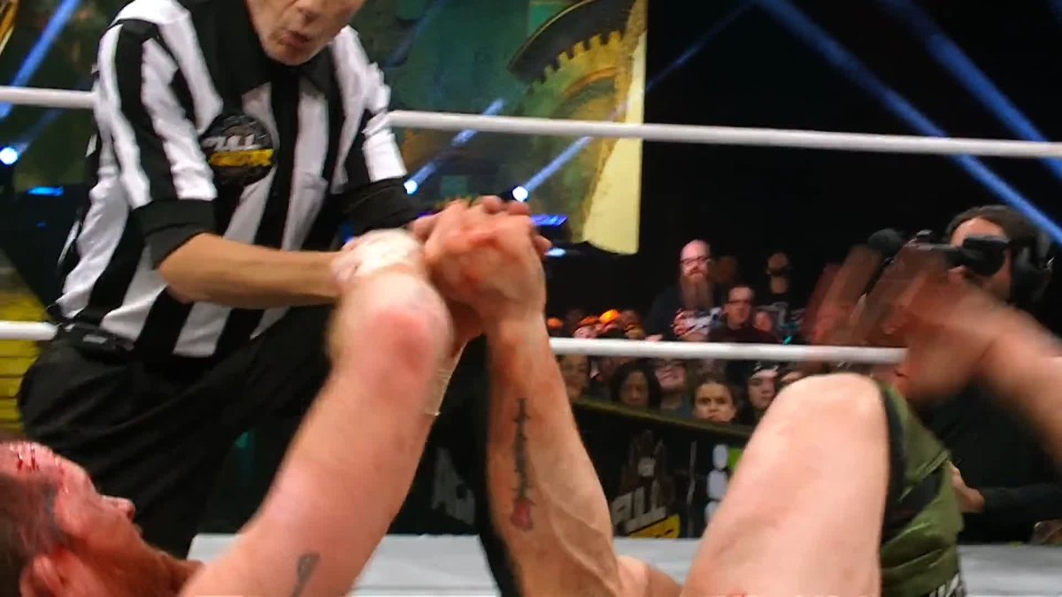 NOW @KORCOMBAT IS USING THE FORK ON @JONMOXLEY! Watch #AEWFullGear on HBO Max PPV