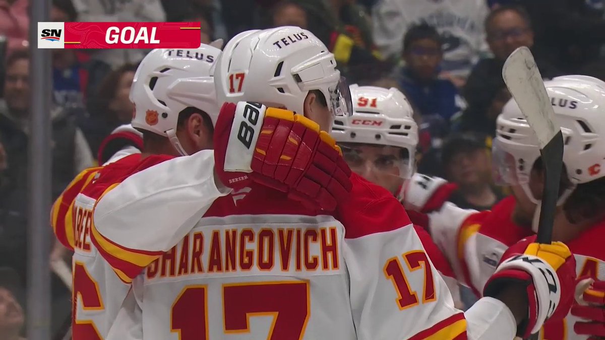 Yegor Sharangovich bats it out of the air to give the Calgary Flames a 4-1 lead! 🔥