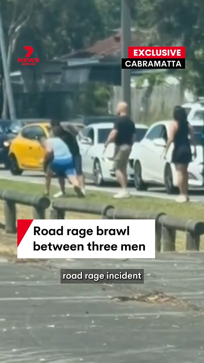 Three men have been filmed trading blows in a road rage brawl out the front of a Hungry Jack's at Cabramatta in Sydney's southwest. #roadrage #brawl #fight #cabramatta #sydney