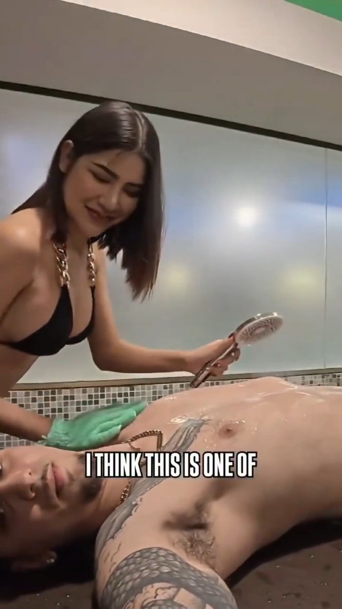 He's being massaged by his fellow men