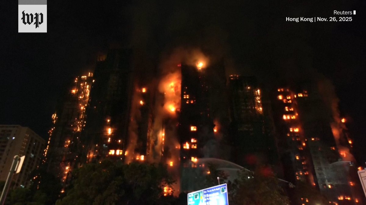 Four people were killed while another three were in critical condition after a fire engulfed at least three high-rise buildings in Hong Kong on Wednesday, the government said.