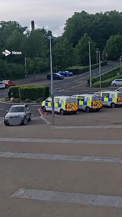 CCTV footage shows ex-soldier attacking police station with petrol bombs.