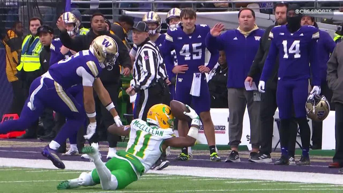 THIS WAS WILD -- ONE-HANDED HELMET CATCH?! After review, it's ruled incomplete.