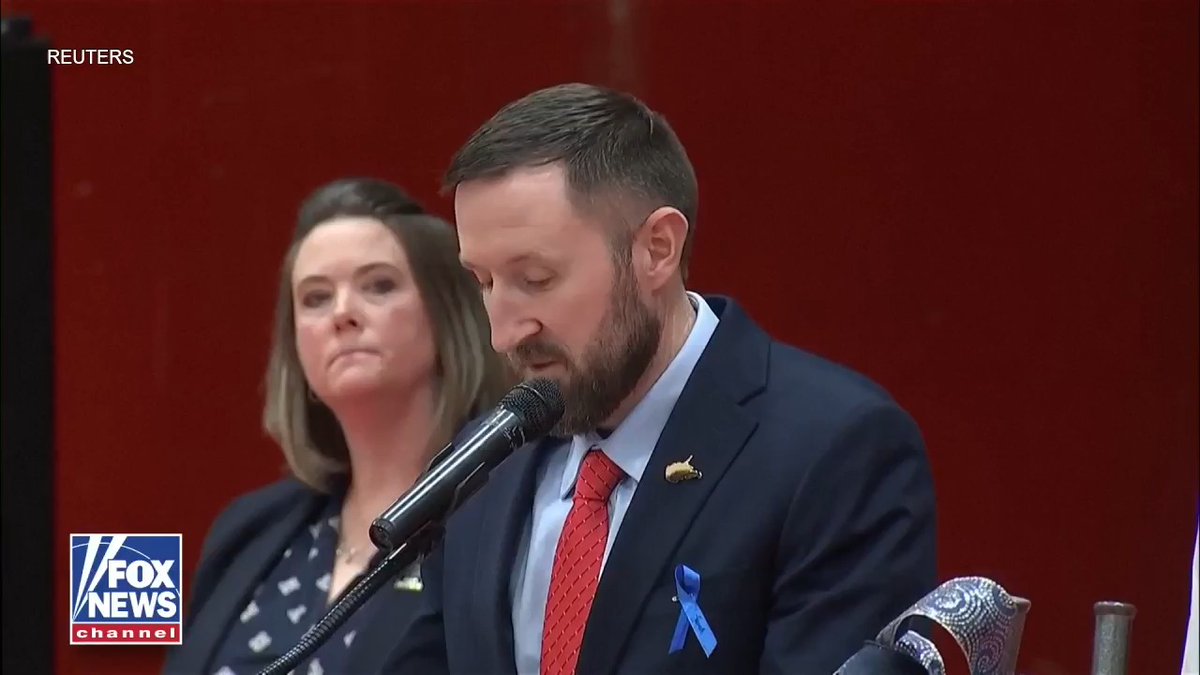 AMERICAN HERO: Principal eulogizes National Guard member Sarah Beckstrom at her hometown vigil. "She carried herself with quiet strength, a contagious smile and a positive energy that lifted people around her."