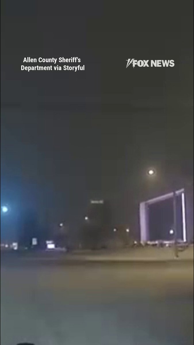 WATCH: Authorities are searching for a hit-and-run driver who sped off after ramming into an officer's patrol car at an Indiana intersection.