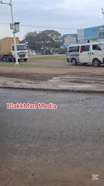 🇬🇭 Road users are expressing alarm as a viral video captures multiple vehicles;including a heavy-duty trailer, a commercial minibus, and a private SUV,illegally passing through the center of the Tema VALCO Roundabout. Instead of using the designated circular route, the drivers are seen cutting across the middle to quickly join moving traffic. Cc: @blakkmanmedia