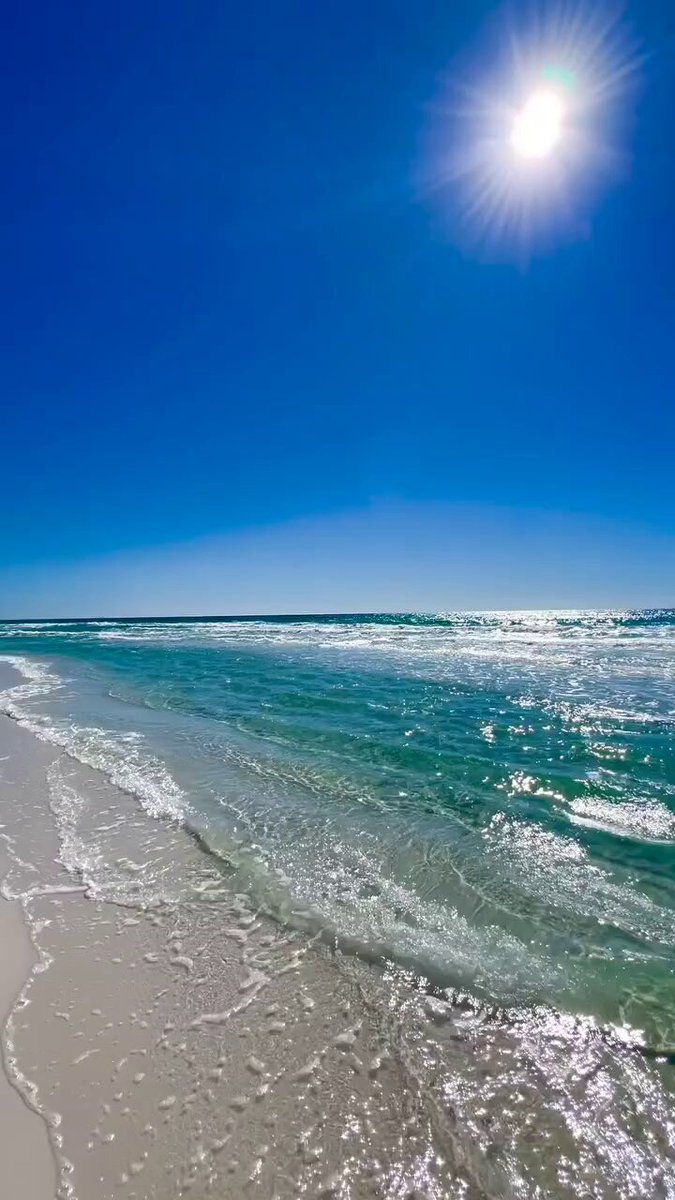 Sun above, waves below, peace within.