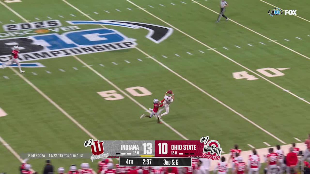 What a throw, and what a catch 😲 No. 2 Indiana Football is starting to feel it. 📺: FOX