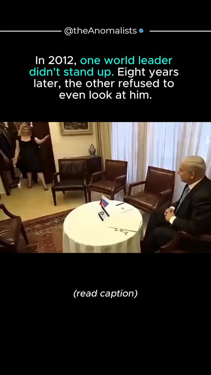 Vladimir Putin deliberately ignoring Israeli Prime Minister Benjamin Netanyahu, walking past him without a glance.