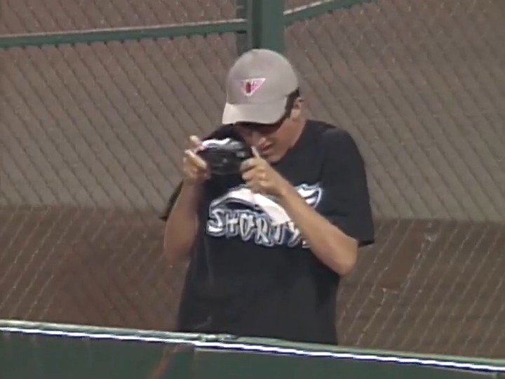 Dude took a pic of the outfielder after he fell in the stands 😂😂