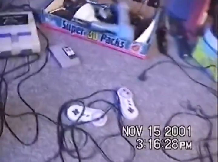 Family unboxing their new Xbox in 2001