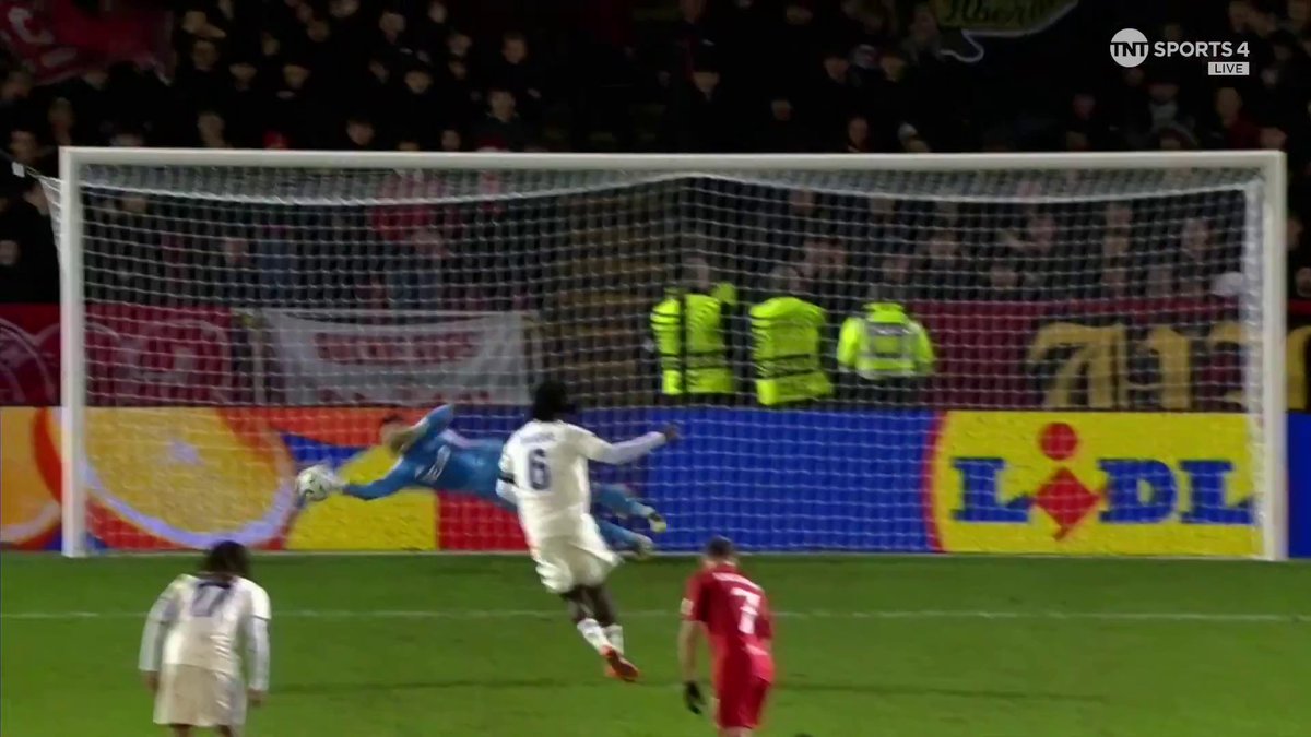 WHAT A SAVE, DIMITAR MITOV 👏 He keeps out the penalty attempt of Ismaël Doukouré 😤 📺 TNT Sports & discovery+ UK
