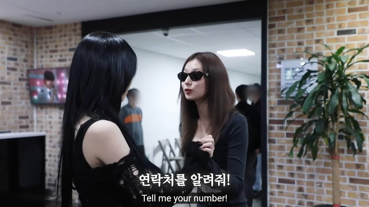 Sana asking for Ryujin's number and saying they should meet up outside of work