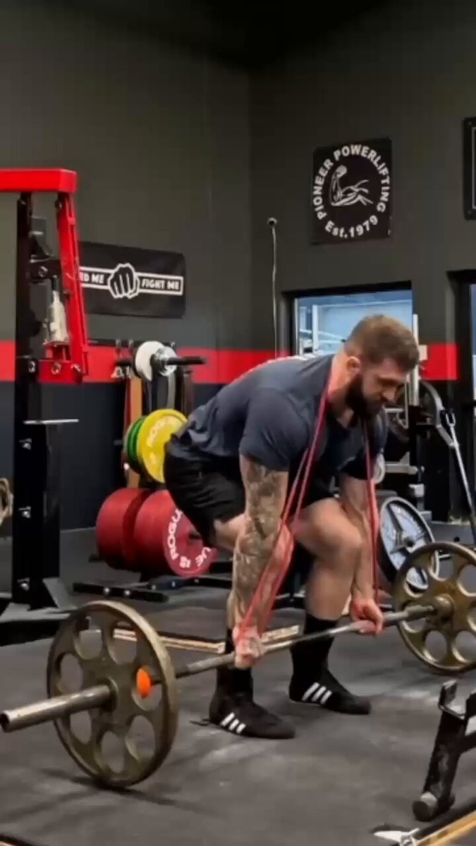 This deadlift warm-up is GOLD! The band drill (demonstrated by powerlifter Chris Bridgeford) teaches you to reach &amp; create LONG ARMS. This engages your lats, stiffens your core &amp; makes your lift more efficient.