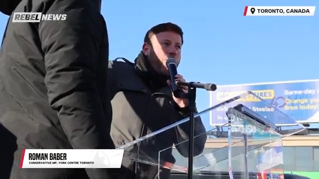 Conservative MP Roman Baber speaks at the Toronto public Menorah lighting at Bathurst & Sheppard, as anti-Israel protesters yell vile, antisemitic chants in the background.