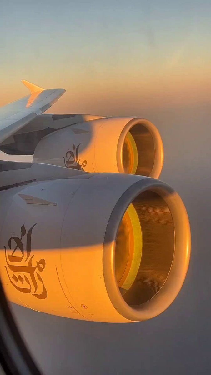 Emirates A380 hack: pick upper deck window seats like 49A for insane golden hour shots like this. Engines look epic in that light. Worth planning your flight around..