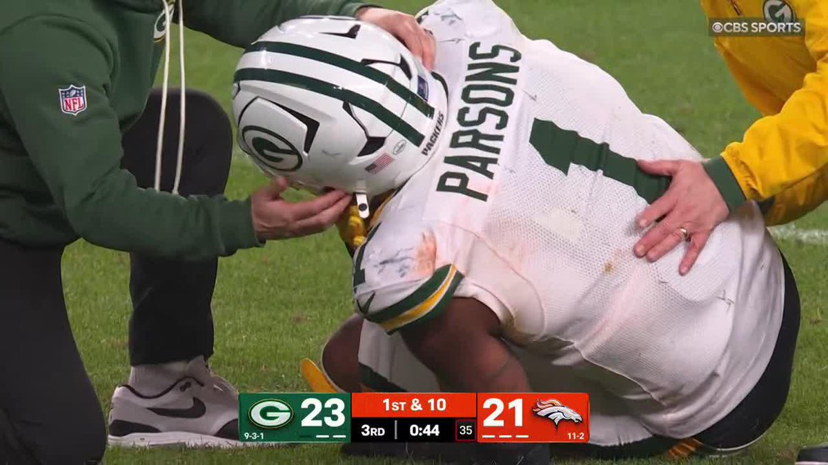 Micah Parsons is down on the field for the Packers