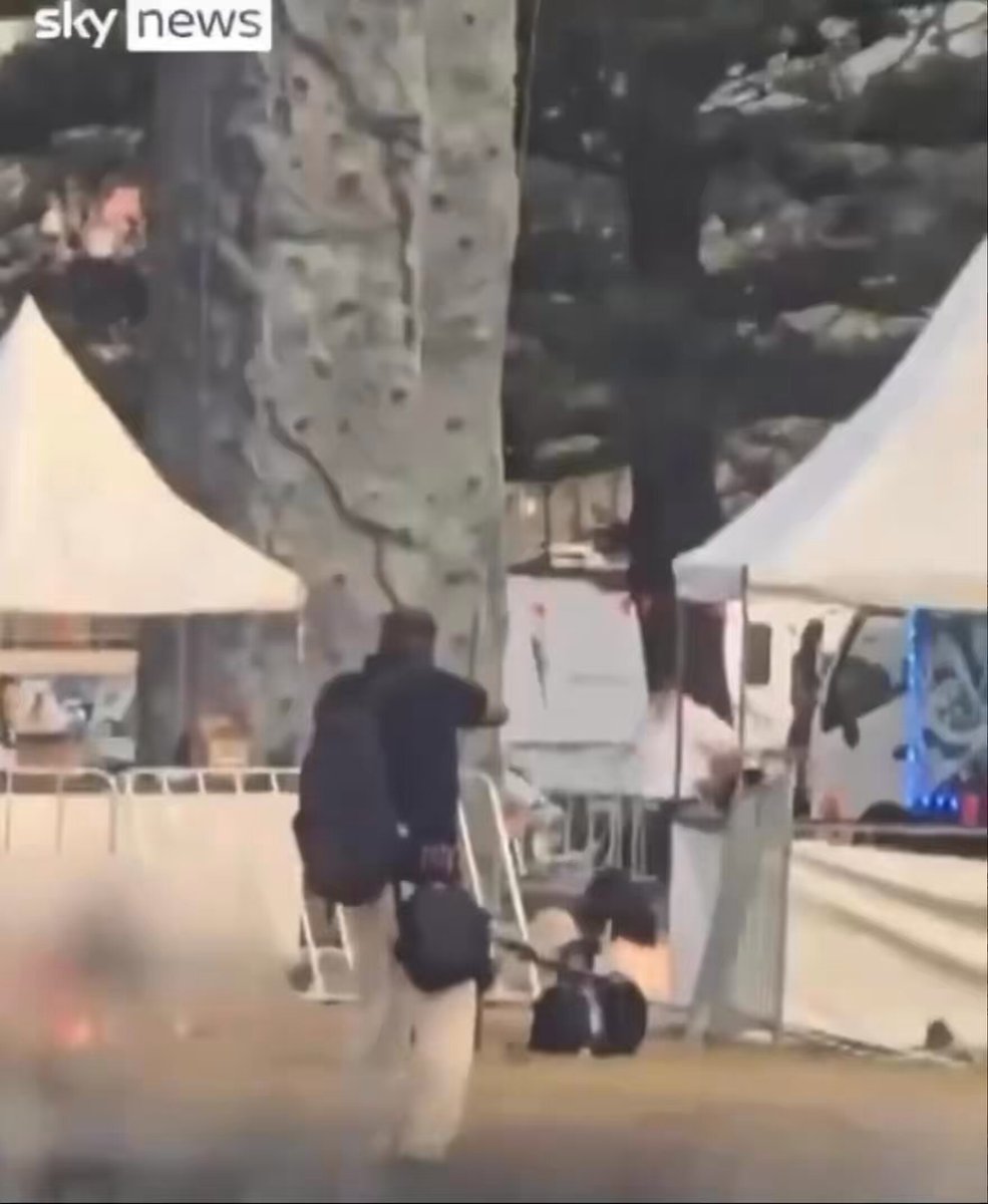 When being shot at, people don’t normally stop and stare at the person shooting at them. What’s going on here?