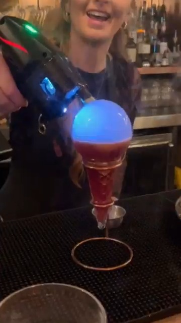 Coolest Cocktail Ever. I think that's a Dry Ice Bubble? Whatever it is it looked amazing and tasted great.