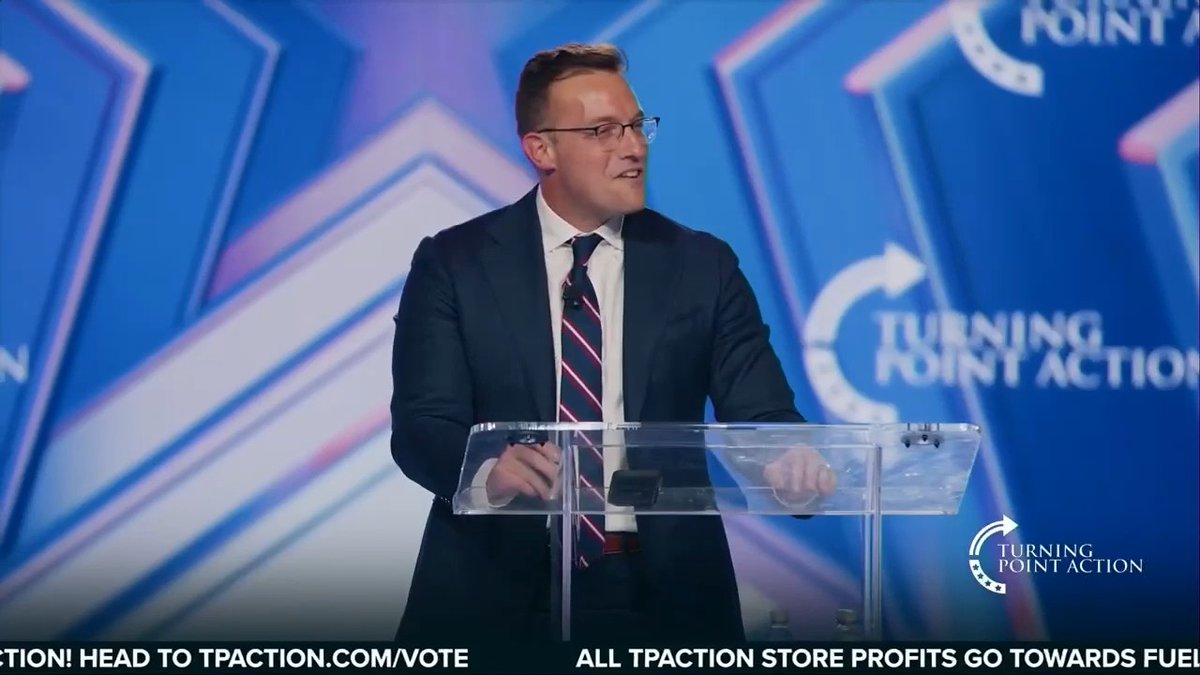 WATCH: Jack Posobiec and Benny Johnson welcome the Target employee who was harassed for wearing a Charlie Kirk “Freedom” T-shirt at work onto the stage at AmericaFest.