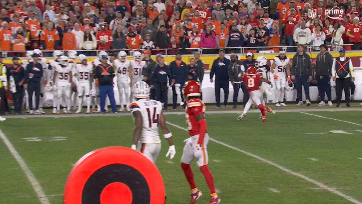 Can someone explain to me how this is not an INT? Ball hit the ground, helping him maintain control on the ball. Should be an incomplete pass…