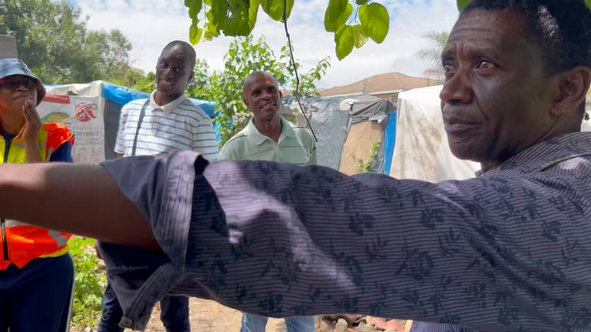 One of the residents tells officials that they must place him in a new home with water and electricity and pay him and his family members R50 000 each if they want to relocate them. He says his former employee left the property to him 40 years ago.
