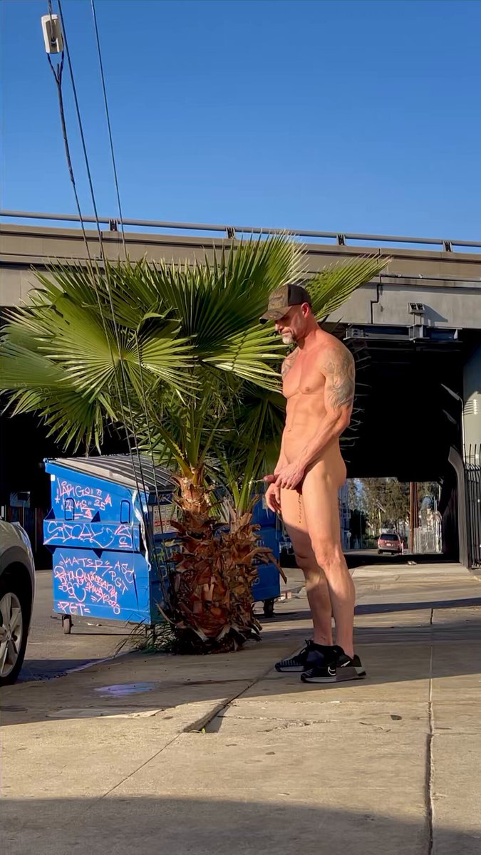 Just pissing naked on the sidewalk.