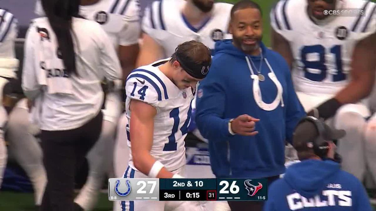 Alec Pierce appears to apologize as he heads off the field following disqualification