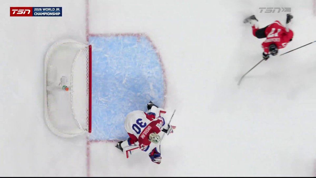 Canada is given a penalty after being pushed into the Czech goalie