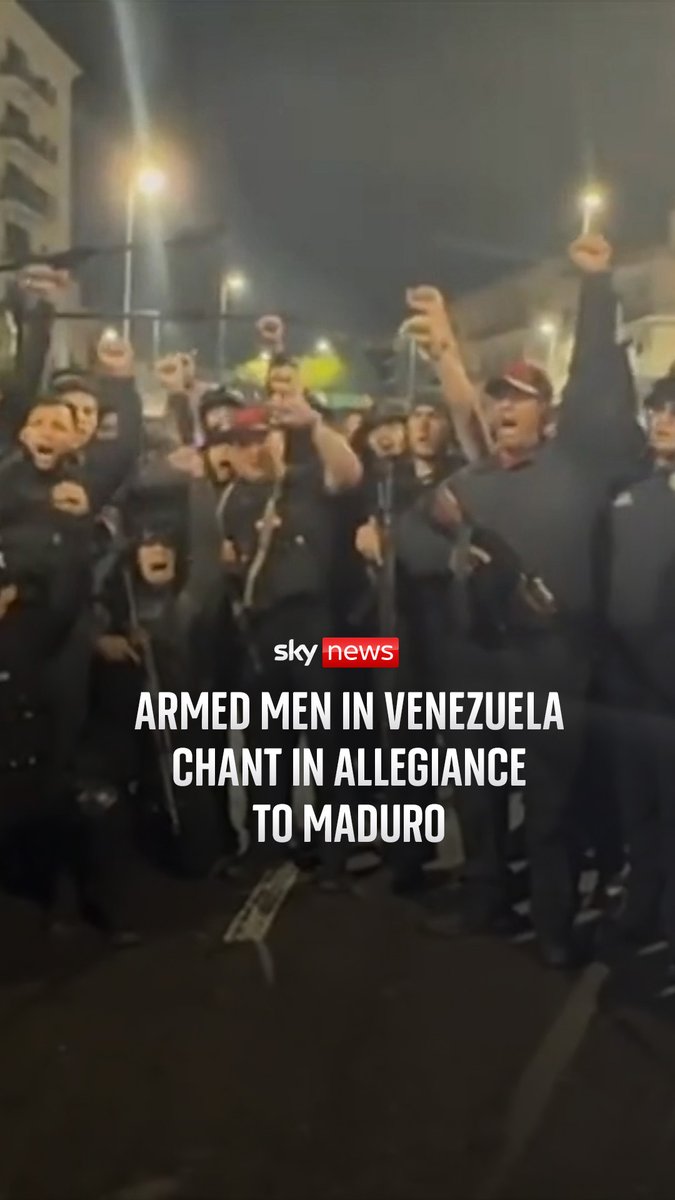 Venezuela's interior minister filmed with armed men chanting in allegiance to former president Nicolas Maduro. Latest: