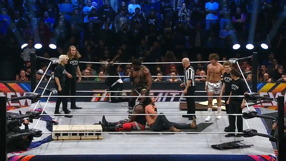 Back to Back, Swerve Strickland + Hangman Page take out The Opps Dojo thanks to an assist from Prince Nana!