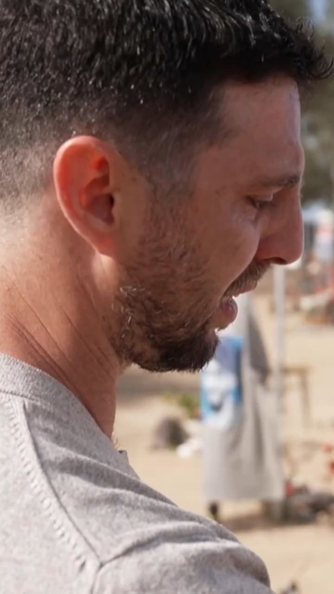 Heartbreaking 💔 Elkana, who was held hostage by Hamas in Gaza for more than two years, visited the Nova music festival memorial and saw photos of his friends who were murdered on October 7. He broke into tears.