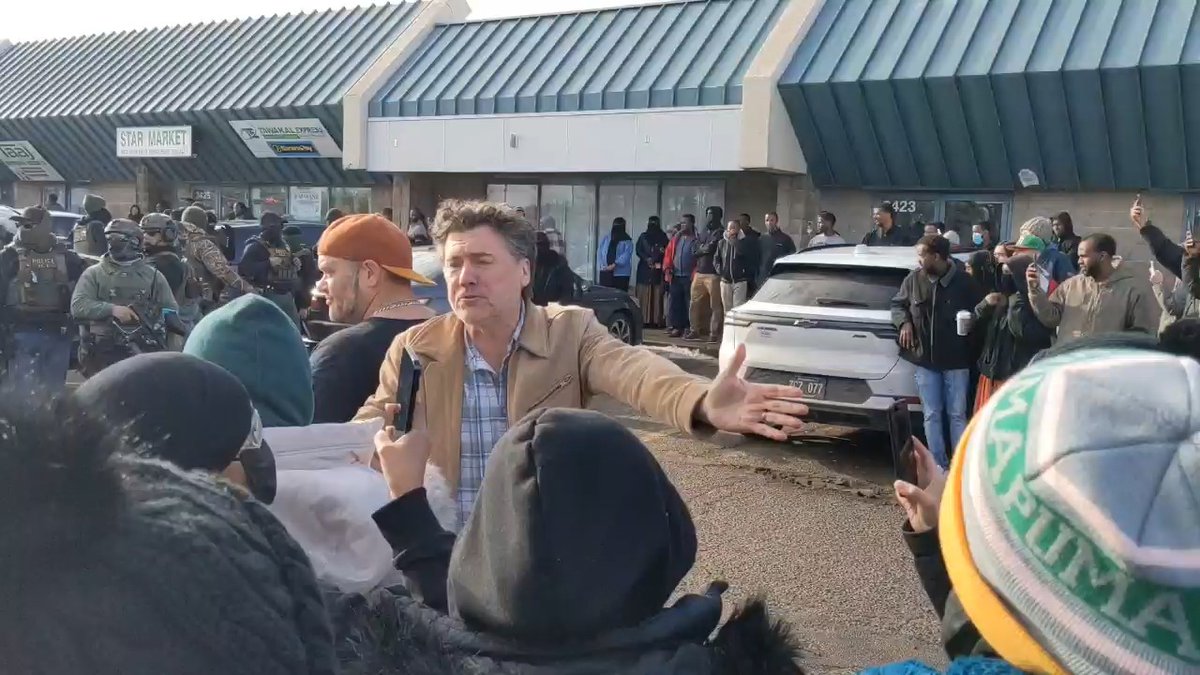 A crowd of hundreds gathered at a St. Cloud strip mall parking lot to observe more than two dozen ICE officers near some Somali-owned businesses. Follow updates on the ICE operation in Minnesota here: